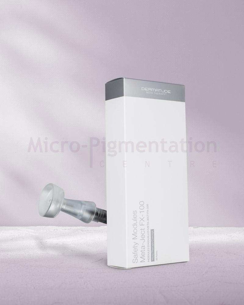 A rectangular white box placed with the front showing and a needle behind it