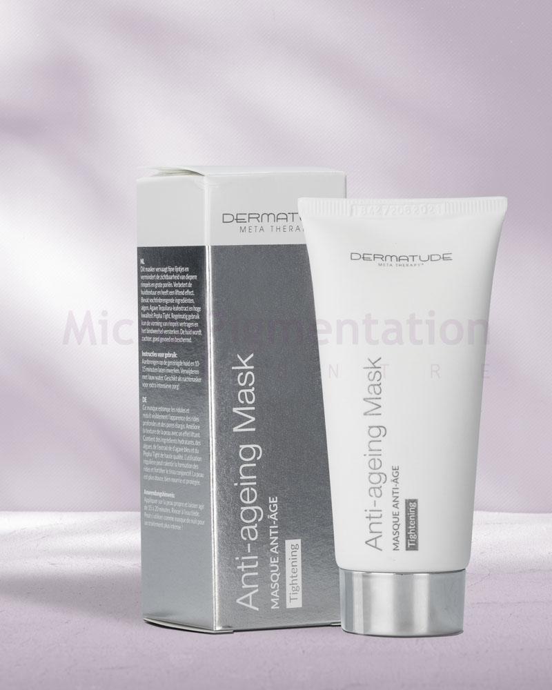 A rectangular grey box, a white tube beside it with a silver cap on a pink background 