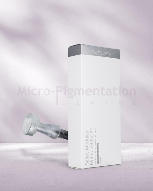 A rectangular white box placed with the front showing and a needle behind it 